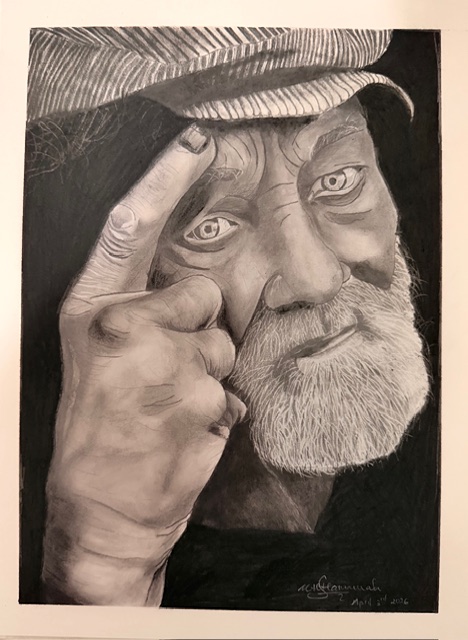 Black and white portrait of an elderly man with a beard, wearing a hat, touching his temple with his finger.