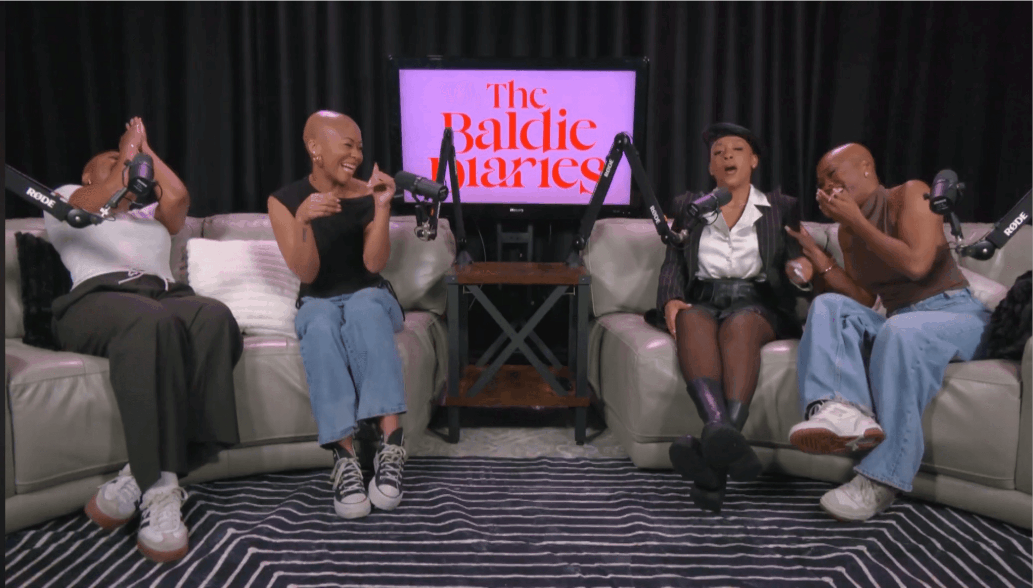 Four people sit on sofas in a talk show set with a screen reading 'the Ballice Marice'.