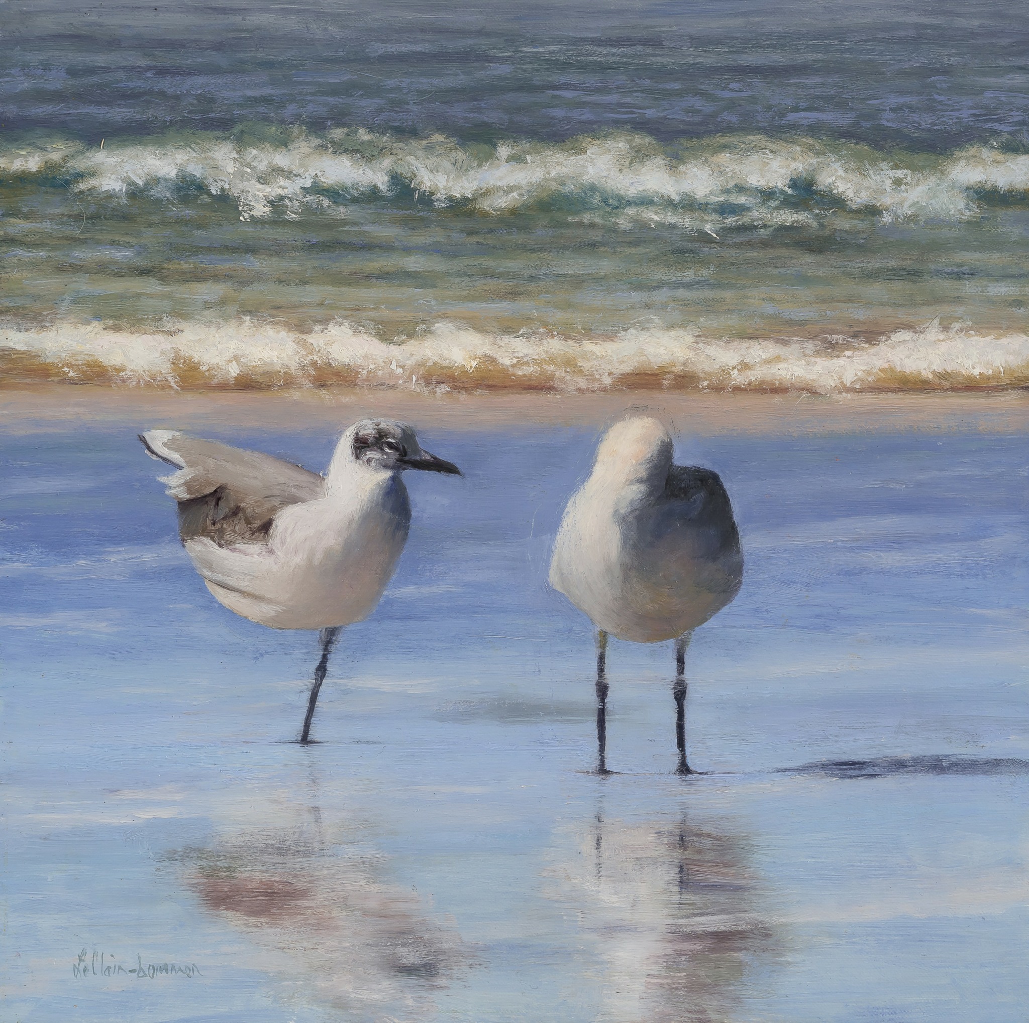 Two seagulls standing on wet sand near the ocean, with waves in the background.