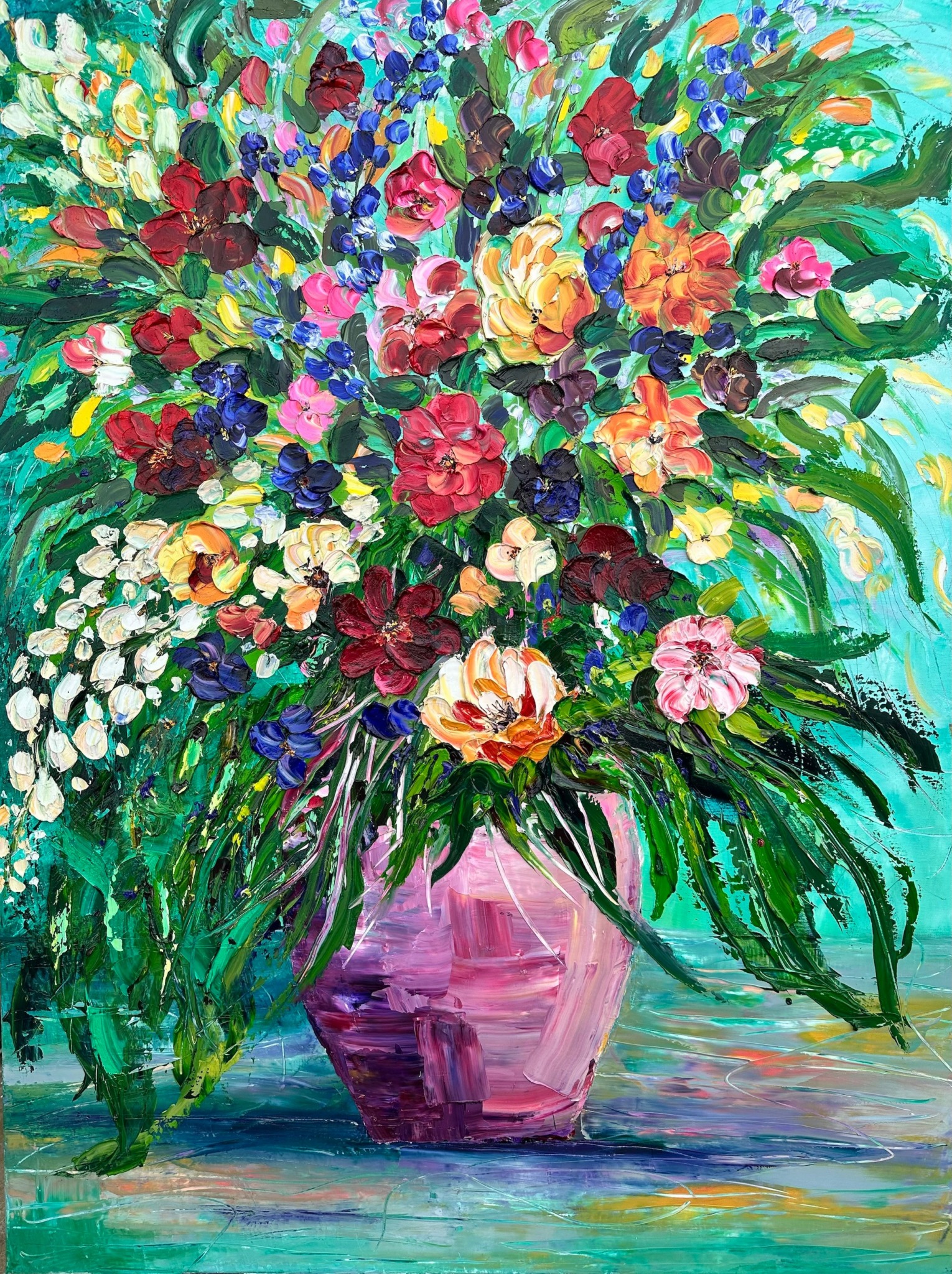 Colorful bouquet of flowers in a pink vase with green leaves and a multicolored background.