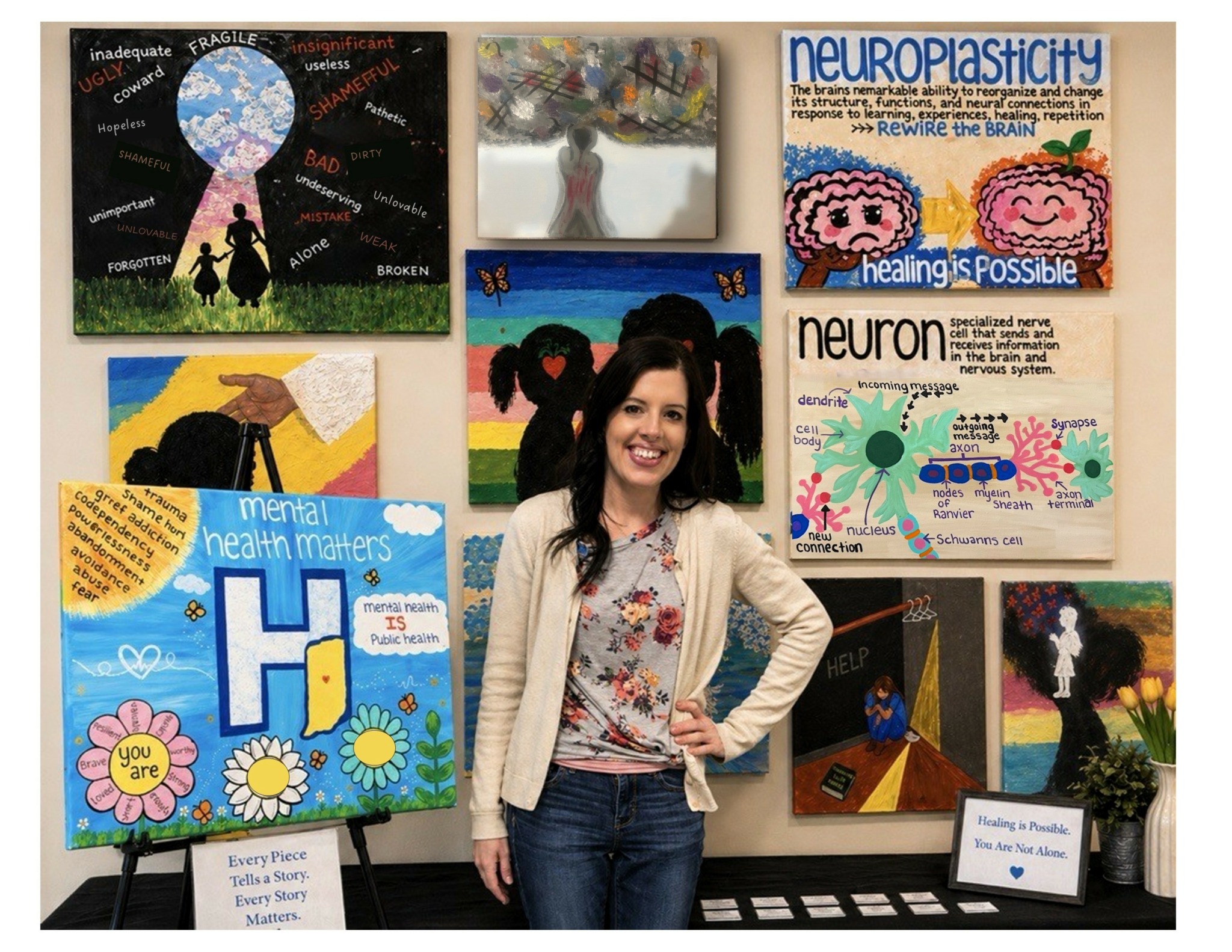 Woman standing in front of colorful science and art posters at exhibition booth.