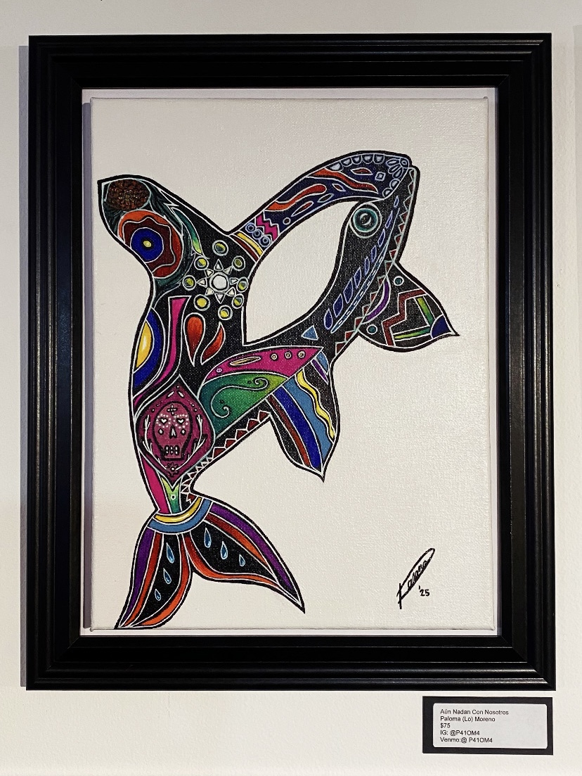 Colorful abstract fish with intricate patterns, framed in black, on white background.