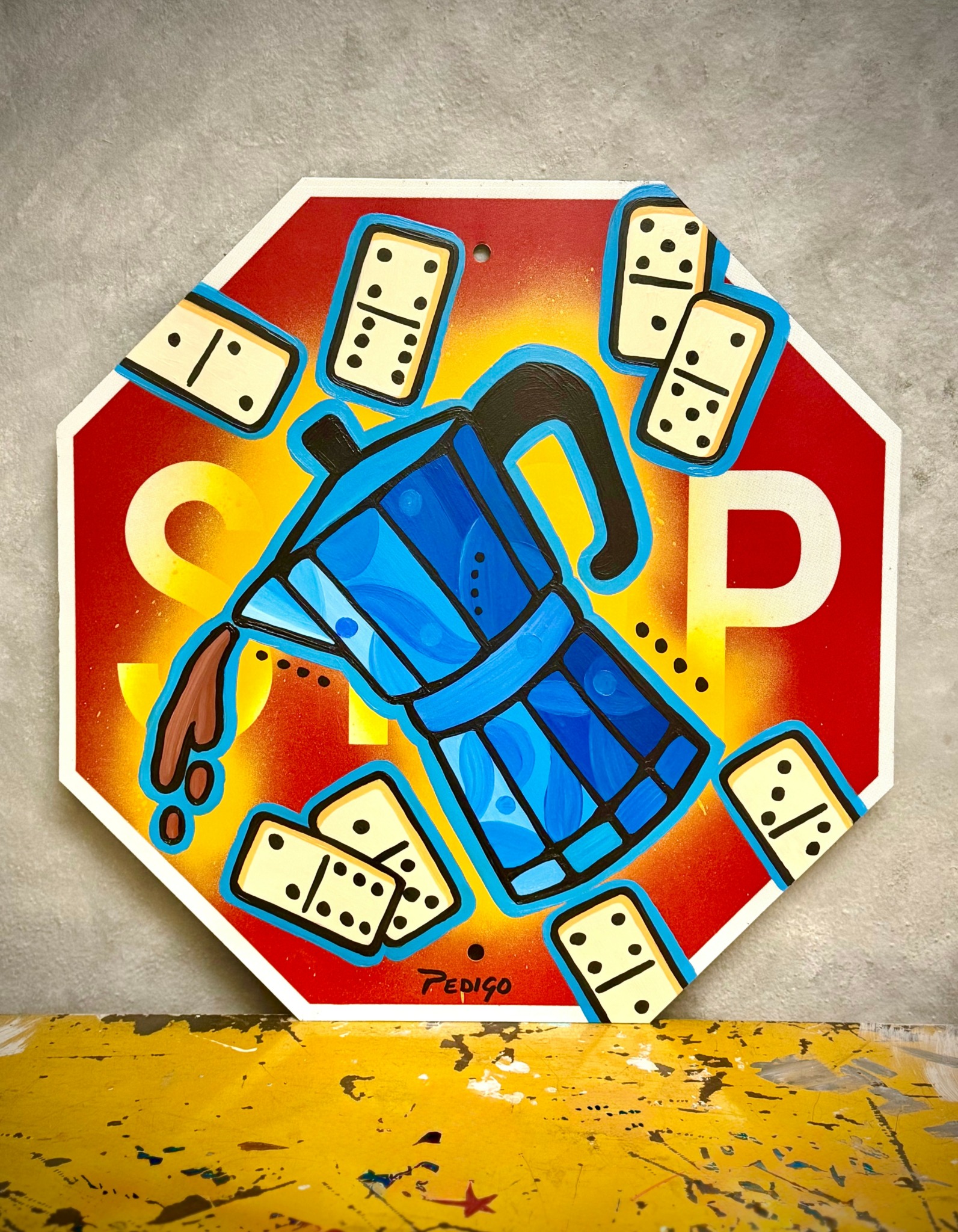 Octagonal sign with domino tiles and a blue backpack illustration, with a yellow and red background.