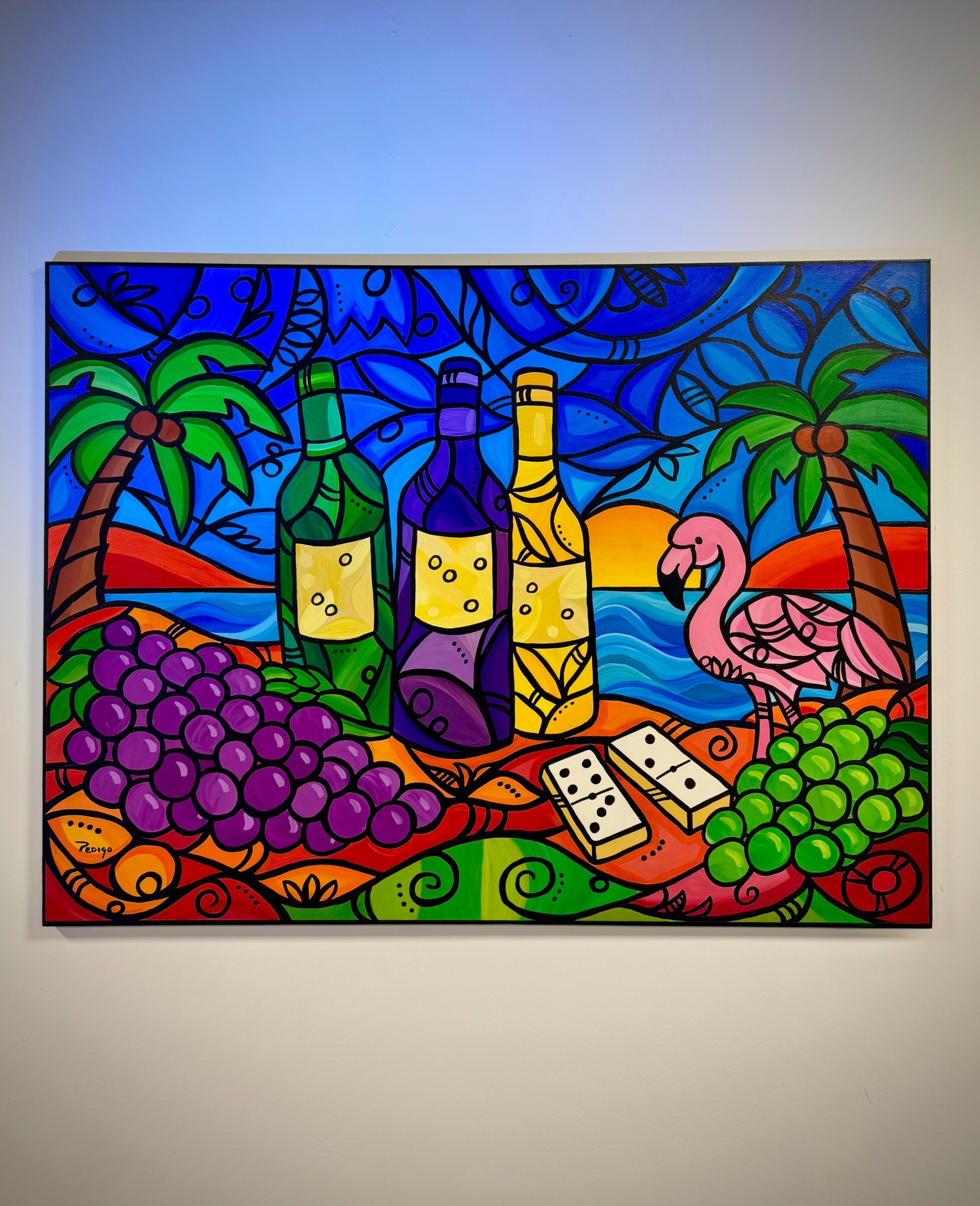Colorful stained glass-style image of three bottles, grapes, a pink flamingo, palm trees, and a sunset over water.