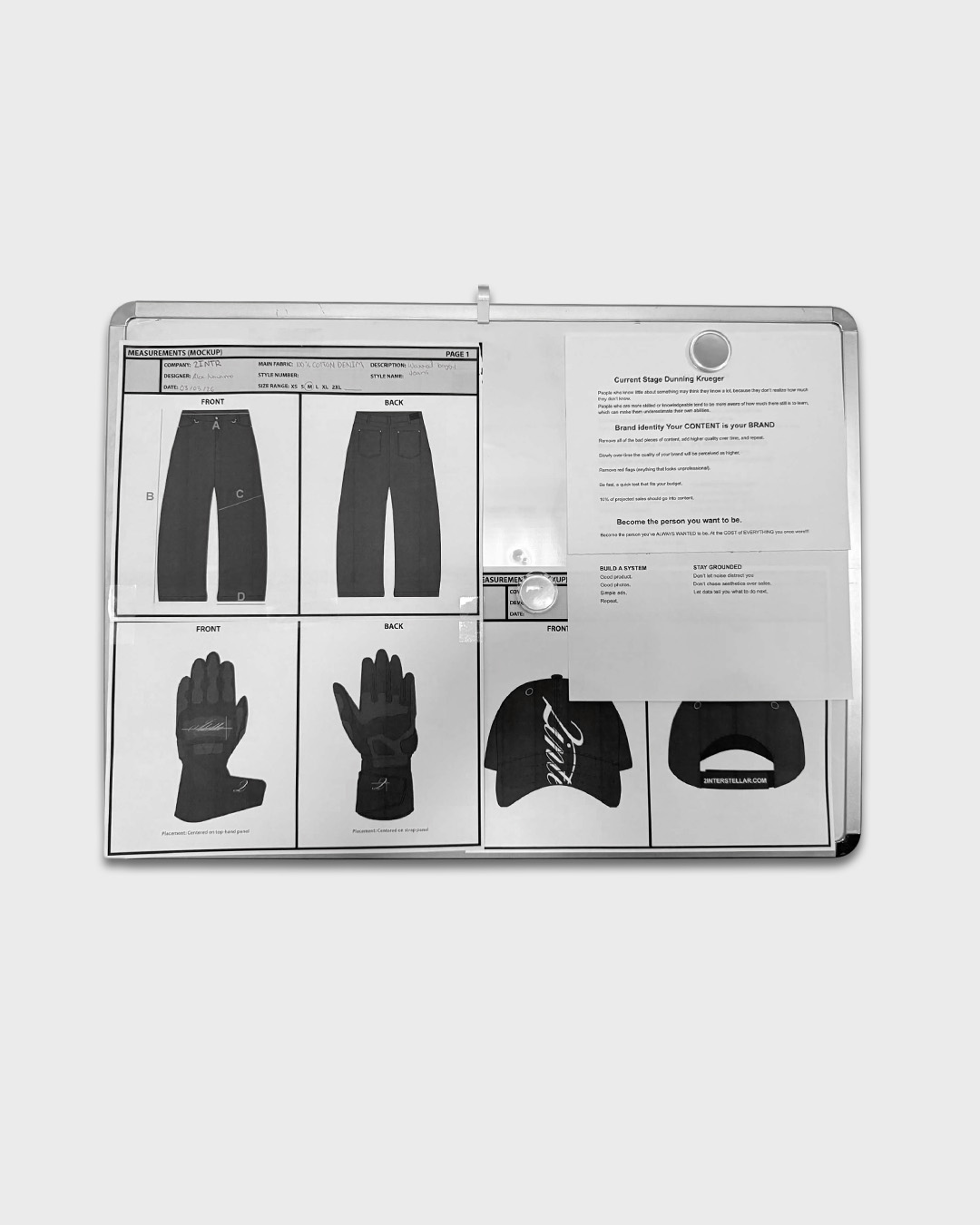 Open folder with images of pants, gloves, and a cap, along with a document on the right side.