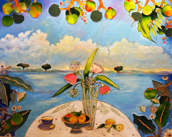 Vase with flowers and fruit on a table by a lake, with trees and clouds in the background.